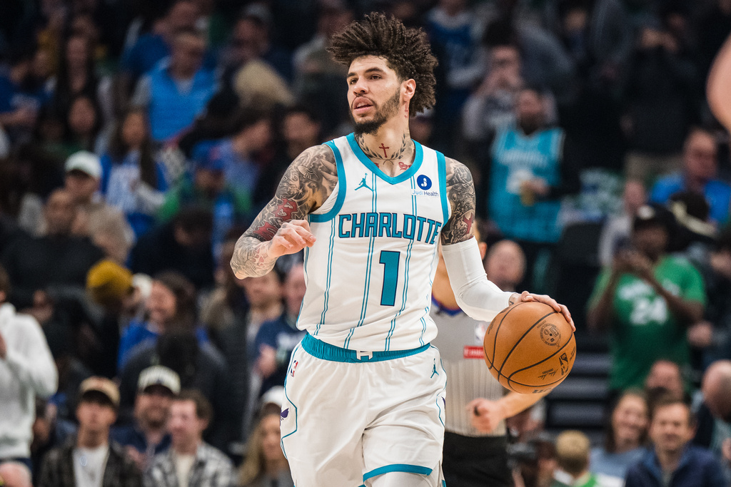 Charlotte Hornets guard LaMelo Ball dribbles the ball during an NBA basketball game against the Dallas Mavericks, Thursday, Jan. 29, 2026, in Dallas. (AP Photo/Jessica Tobias)