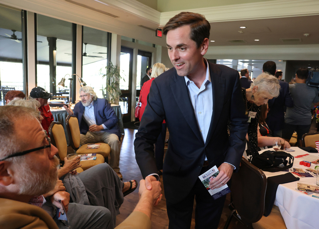 FILE - Texas Attorney General candidate State Sen. Mayes Middleton shakes hands during a campaign stop, Sept. 16, 2025, in Waco, Texas. (Rod Aydelotte/Waco Tribune-Herald via AP, File)