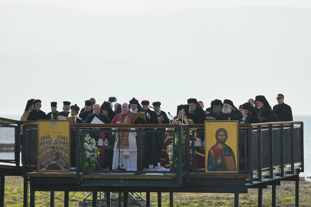 Pope Leo XIV and Ecumenical Patriarch Bartholomew I, the spiritual leader of the world's Eastern Orthodox Christians lead an Ecumenical prayer service at archaeological excavations of the ancient Byzantine-era Christian Saint Neophytos Basilica, in Iznik, Turkey, Friday, Nov. 28, 2025, marking the 1,700 years anniversary of the Council of Nicaea. (AP Photo/Khalil Hamra)