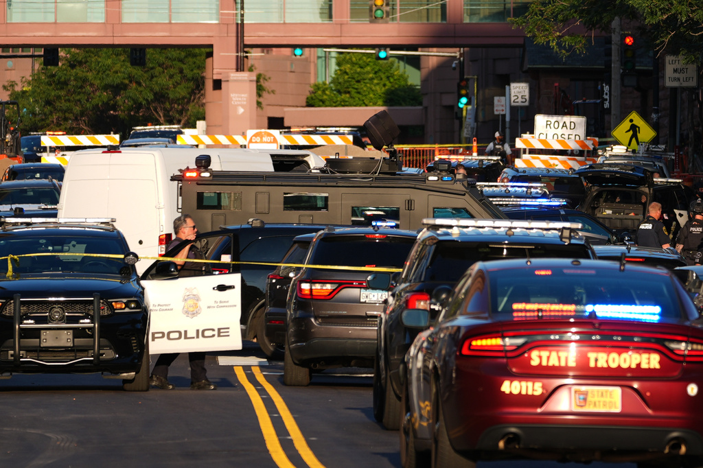 Law enforcement respond to a shooting Wednesday, Sept. 2, 2026, in downtown Minneapolis. (AP Photo/Ellen Schmidt)