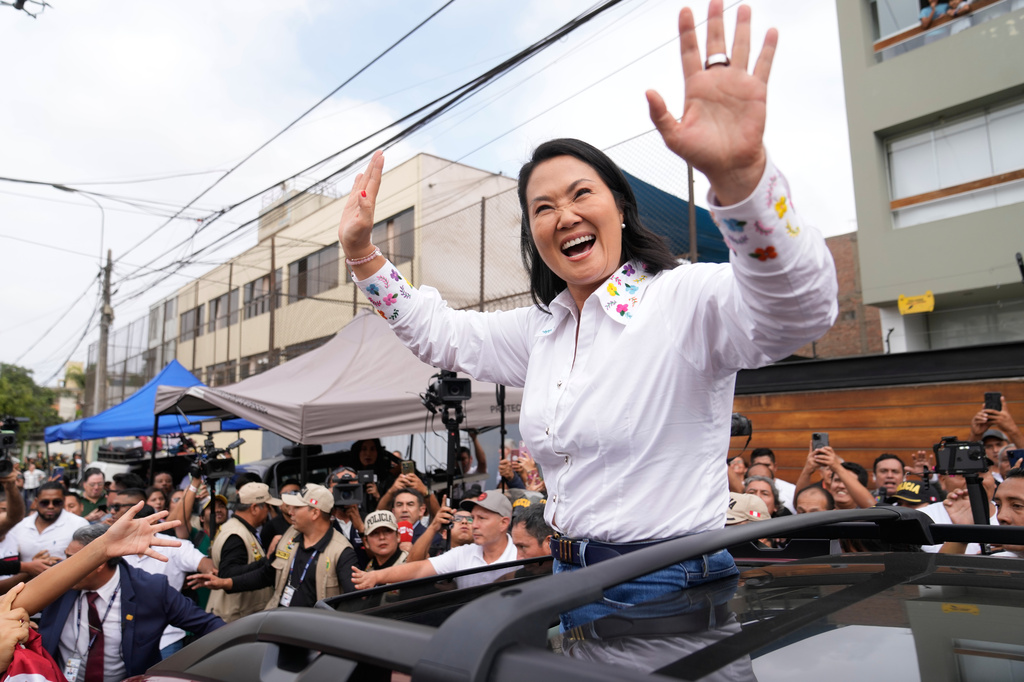 FILE - Presidential candidate Keiko Fujimori, of the Popular Force party, waves after voting during the presidential runoff election in Lima, Peru, June 7, 2026. (AP Photo/Martin Mejia, File)