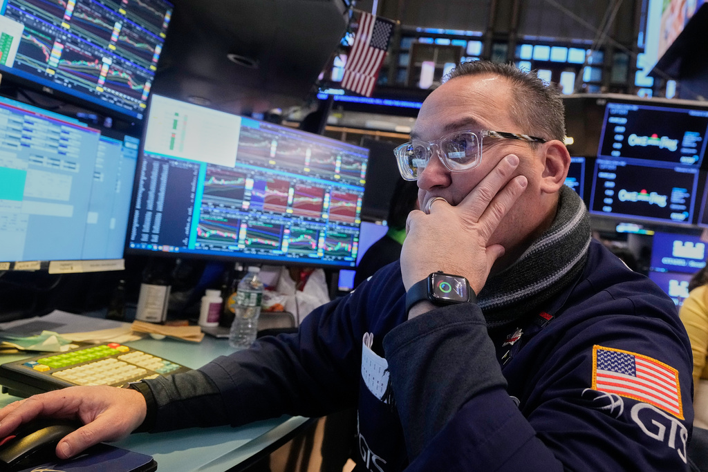 Specialist Anthony Matesic works at his post on the floor of the New York Stock Exchange, Friday, Feb. 6, 2026. (AP Photo/Richard Drew)