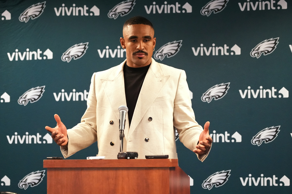 Philadelphia Eagles quarterback Jalen Hurts responds to a question during a news conference after an NFL football game against the Chicago Bears in Chicago, Monday, Sept. 28, 2026. (AP Photo/David Banks)