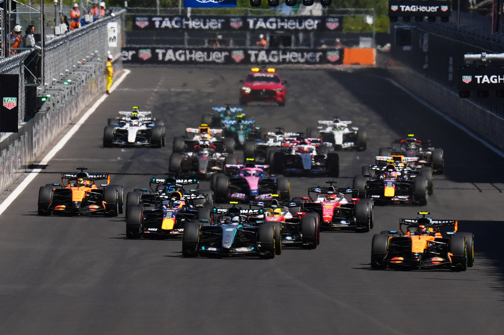 McLaren driver Lando Norris of Britain, right, leads the field after the start of the Spanish Formula One Grand Prix race in Madrid, Sunday, Sept. 13, 2026. (AP Photo/Manu Fernandez)