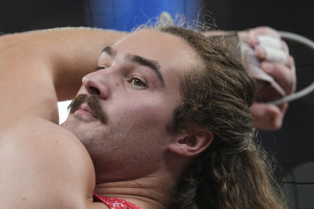 Canada's Ethan Katzberg competes in the men's hammer throw final at the World Athletics Championships in Tokyo, Tuesday, Sept. 16, 2025. (AP Photo/Ashley Landis)