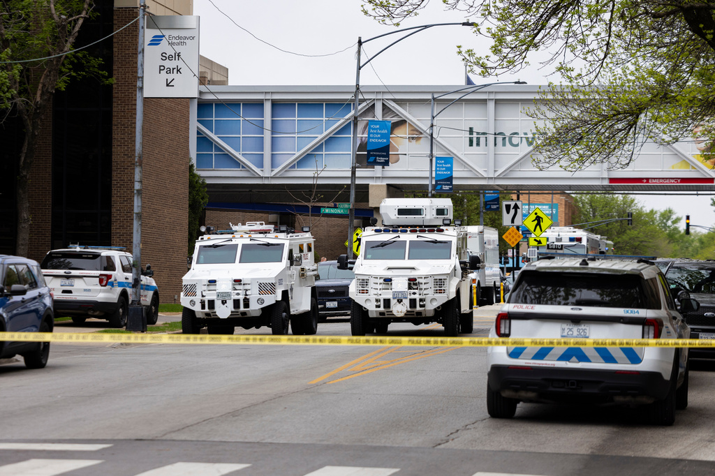 Chicago Police investigate the scene outside of Endeavor Health Swedish Hospital in Chicago, Saturday, April 25, 2026, after a shooting. (Anthony Vazquez/Chicago Sun-Times via AP)