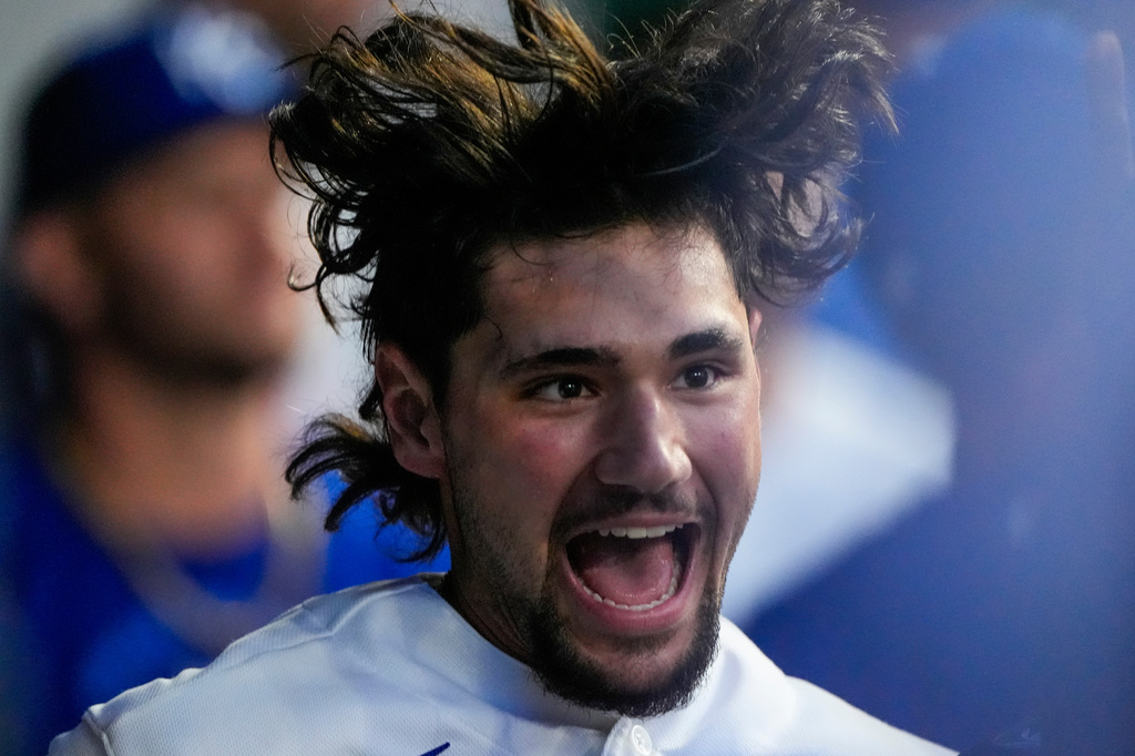 Kansas City Royals' Jac Caglianone celebrates in the dugout after hitting a solo home run during the sixth inning of a baseball game against the Cleveland Guardians, Monday, May 4, 2026, in Kansas City, Mo. (AP Photo/Charlie Riedel)