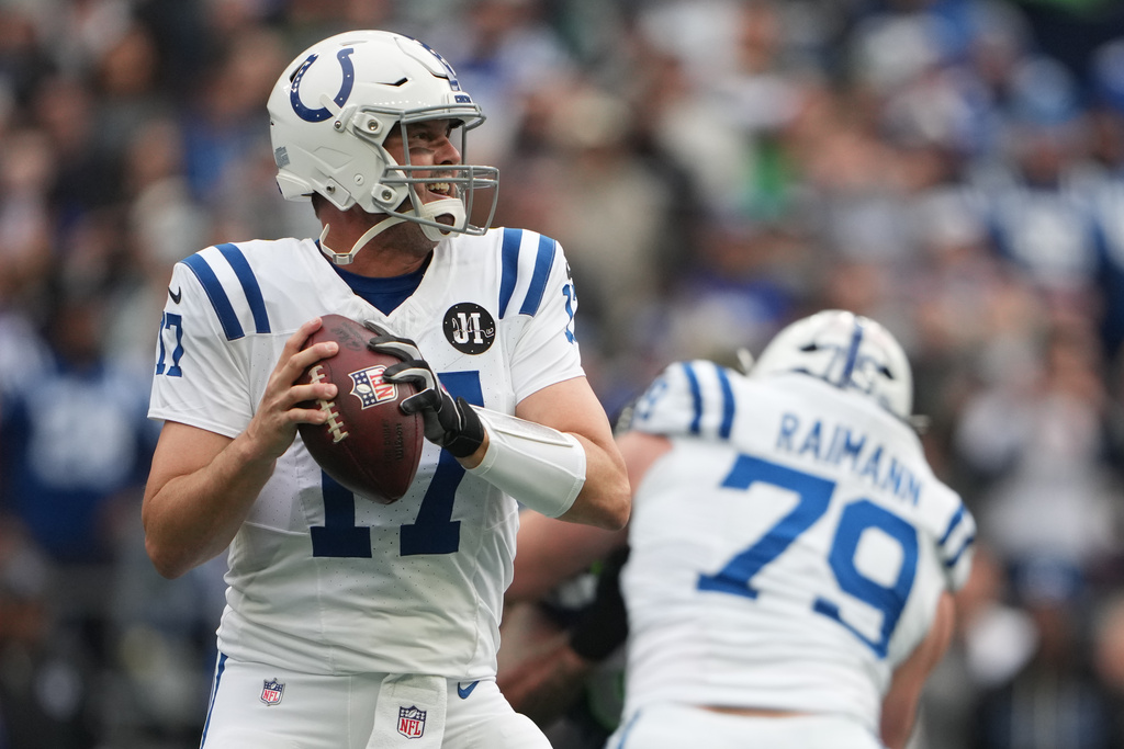 Indianapolis Colts quarterback Philip Rivers (17) looks to throw during the first half of an NFL football game against the Seattle Seahawks, Sunday, Dec. 14, 2025, in Seattle. (AP Photo/Lindsey Wasson)