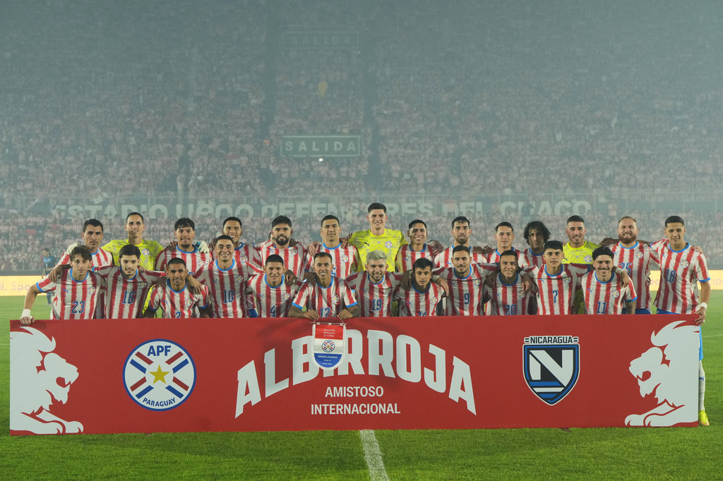 Paraguay's team pose for a group photo prior to an international friendly soccer match against Nicaragua in Asuncion, Paraguay, Friday, June 5, 2026. (AP Photo/Jorge Saenz)