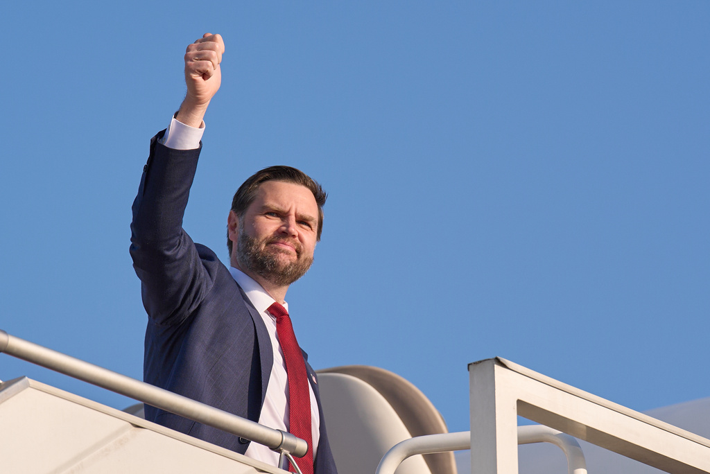 Vice President JD Vance gives a thumbs up gesture while boarding Air Force Two as he leaves Islamabad, Sunday, April 12, 2026, after attending talks on Iran. (AP Photo/Jacquelyn Martin, Pool)