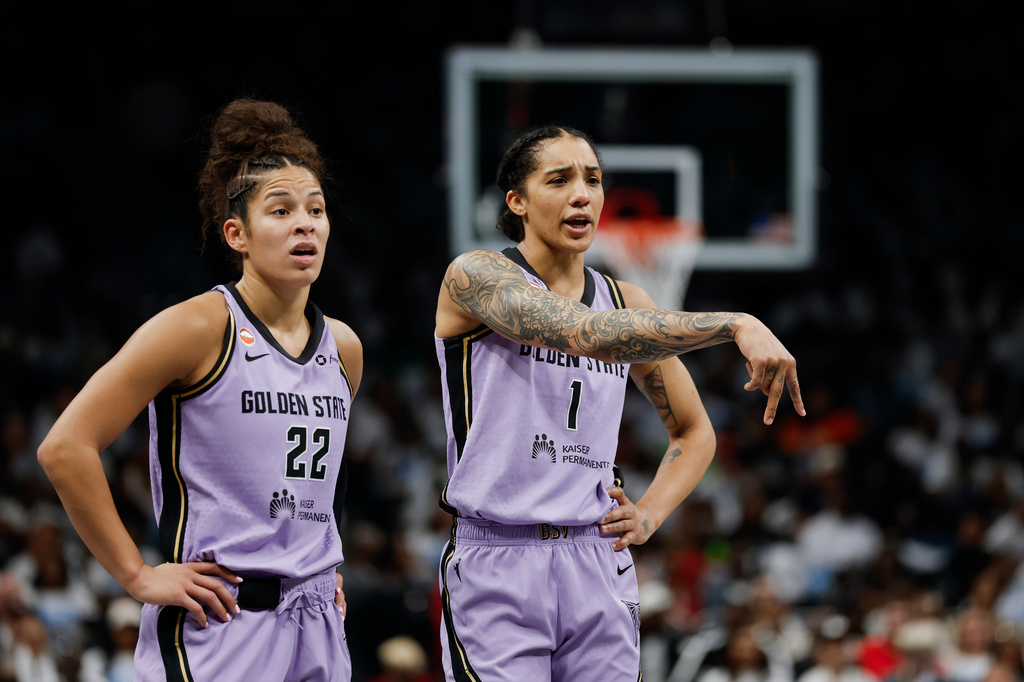 Golden State Valkyries forward Gabby Williams (1) gestures next to guard Veronica Burton during the first half of Game 4 of the WNBA Finals against the Atlanta Dream at State Farm Arena, Saturday, Oct. 24, 2026, in Atlanta. (Carlos Avila Gonzalez/San Francisco Chronicle via AP)