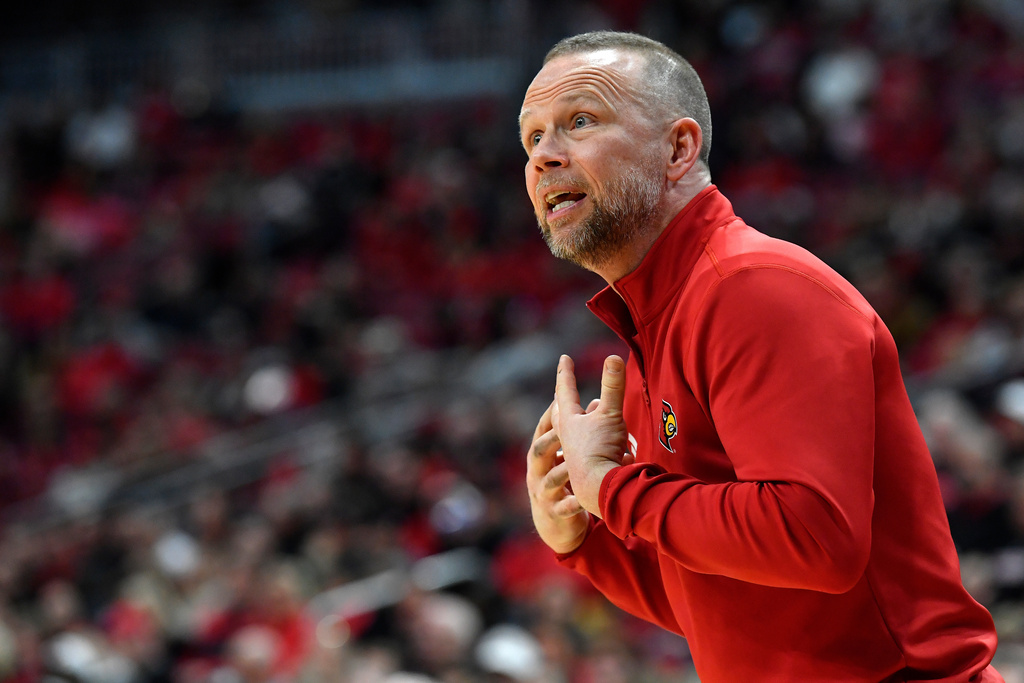 Louisville head coach Pat Kelsey argues a call during the first half of an NCAA college basketball game against Montana in Louisville, Ky., Saturday, Dec. 20, 2025. (AP Photo/Timothy D. Easley)
