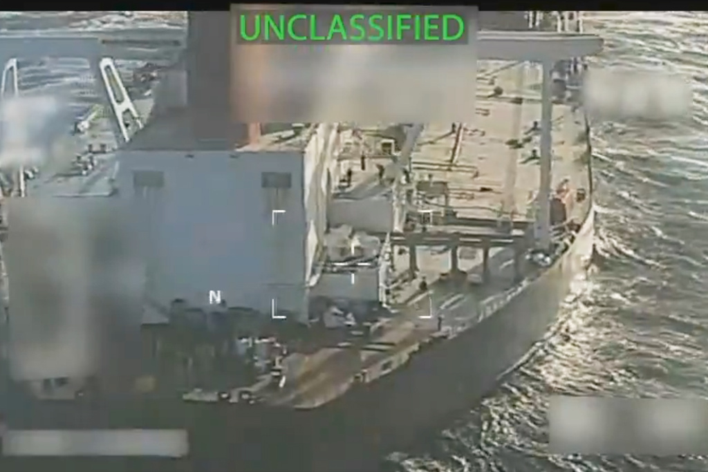This image from video posted on Attorney General Pam Bondi's X account, and partially redacted by the source, shows an oil tanker being seized by U.S. forces off the coast of Venezuela, Wednesday, Dec. 10, 2025. (U.S. Attorney General's Office/X via AP)