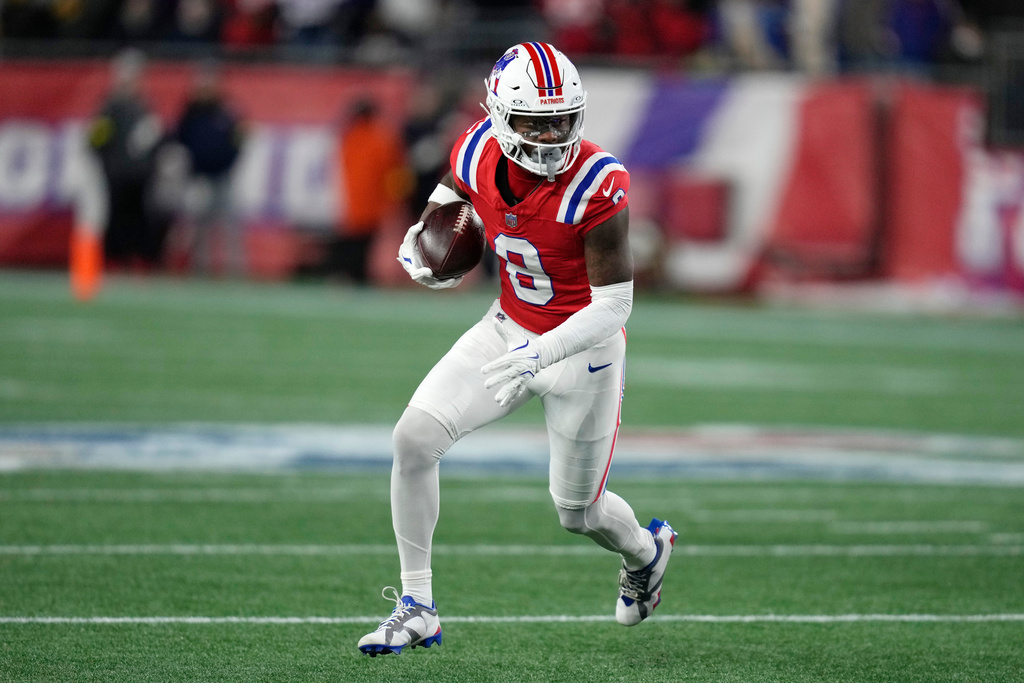 New England Patriots wide receiver Stefon Diggs runs during the first half of an NFL football game against the New York Giants, Monday, Dec. 1, 2025, in Foxborough, Mass. (AP Photo/Charles Krupa)