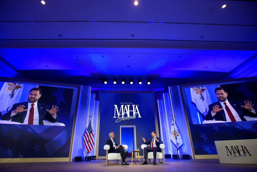 Vice President JD Vance, right, is joined by Health and Human Services Secretary Robert F. Kennedy, Jr., at the inaugural Make America Healthy Again summit at the Waldorf Astoria, Wednesday, Nov. 12, 2025, in Washington. (AP Photo/Rod Lamkey, Jr.)