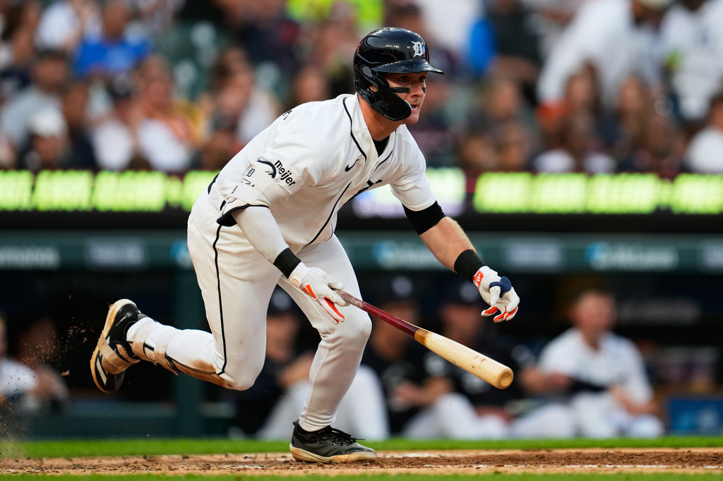 Detroit Tigers' Kevin McGonigle hits a two-run double against the Cleveland Guardians during the fifth inning of a baseball game Tuesday, Aug. 11, 2026, in Detroit. (AP Photo/Paul Sancya)