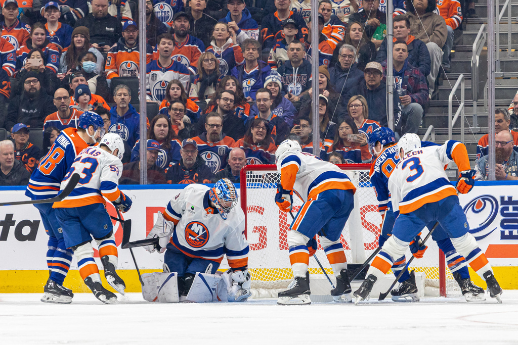 New York Islanders' Ilya Sorokin (30) makes a save the against Edmonton Oilers during the third period of an NHL hockey game in Edmonton, Alberta, Thursday, Jan. 15, 2026. (Timothy Matwey/The Canadian Press via AP)