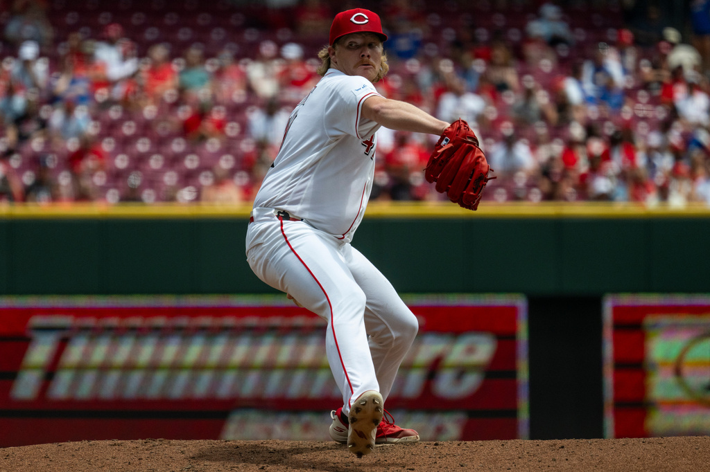 Cincinnati Reds pitcher Andrew Abbott delivers in the third inning of a baseball game against the Arizona Diamondbacks, Sunday, June 14, 2026, in Cincinnati. (AP Photo/Michael Swensen)
