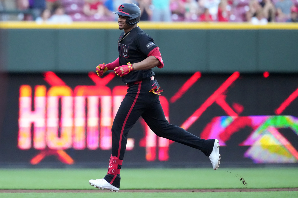 Cincinnati Reds' Noelvi Marte rounds the bases after hitting a solo home run during the first inning of a baseball game against the Arizona Diamondbacks, Friday, June 12, 2026, in Cincinnati. (AP Photo/Kareem Elgazzar)