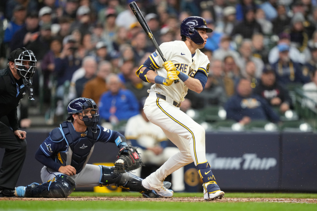 Milwaukee Brewers' Christian Yelich hits a two-run RBI single during the eighth inning of a baseball game against the Tampa Bay Rays, Wednesday, April 1, 2026, in Milwaukee. (AP Photo/Kayla Wolf)