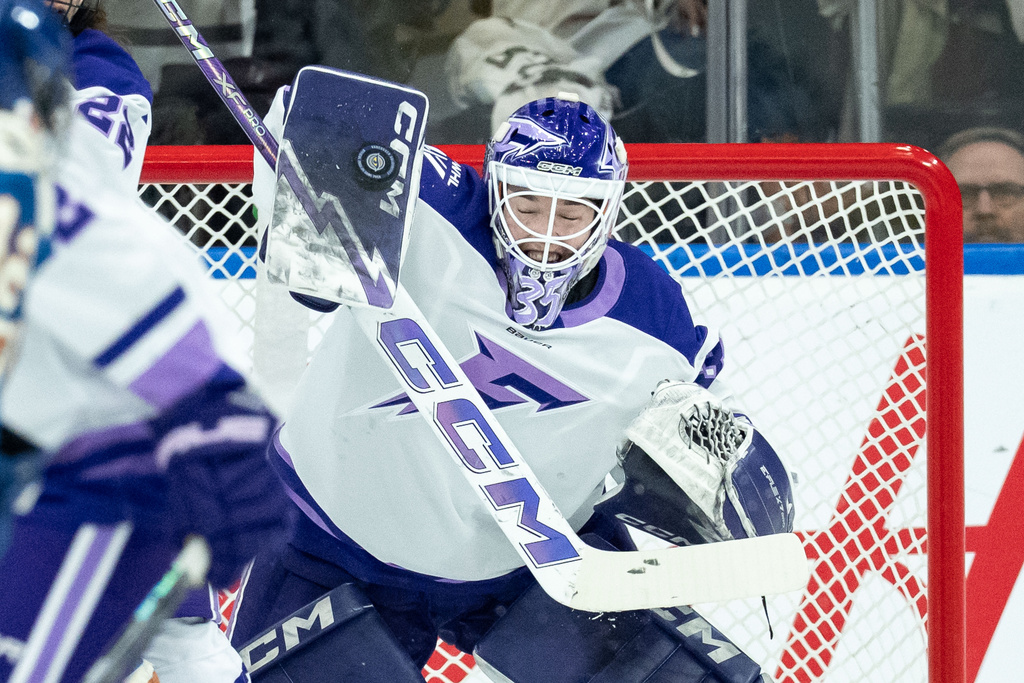 Minnesota Frost goaltender Maddie Rooney (35) makes a save against the Vancouver Goldeneyes during the second period of a PWHL hockey game in Vancouver, British Columbia, Saturday, March 21, 2026. (Ethan Cairns/The Canadian Press via AP)