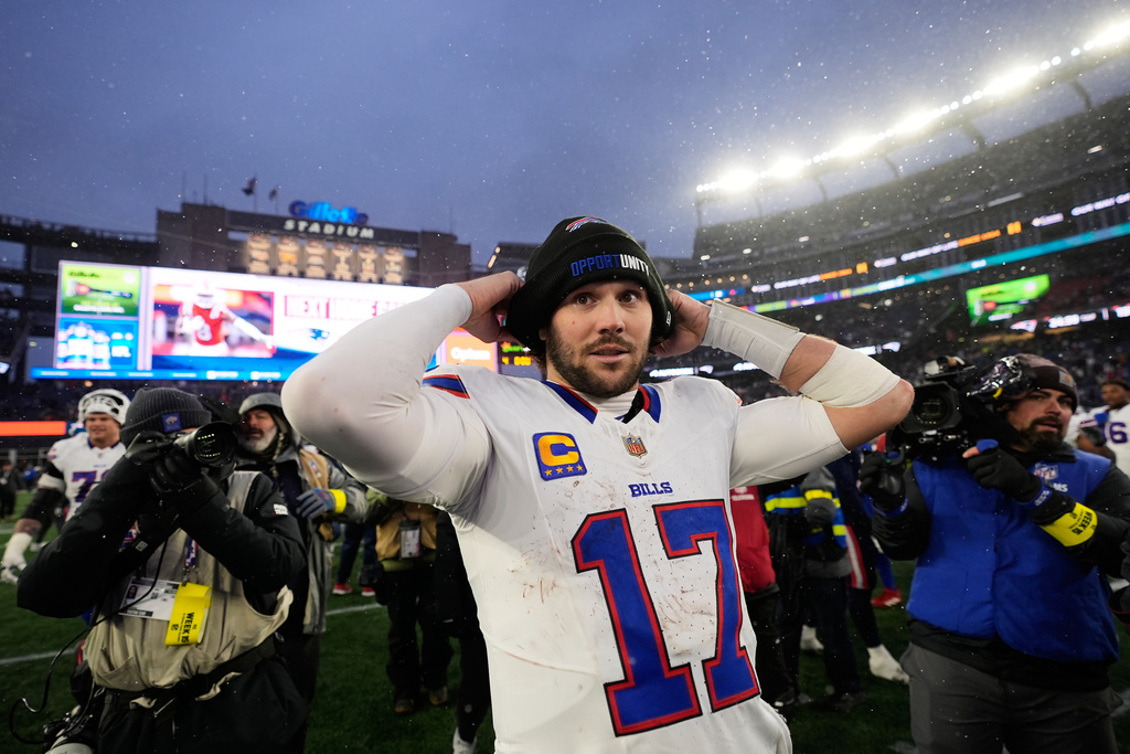 Buffalo Bills quarterback Josh Allen (17) reacts after an NFL football game against the New England Patriots in Foxborough, Mass., Sunday, Dec. 14, 2025. (AP Photo/Charles Krupa)