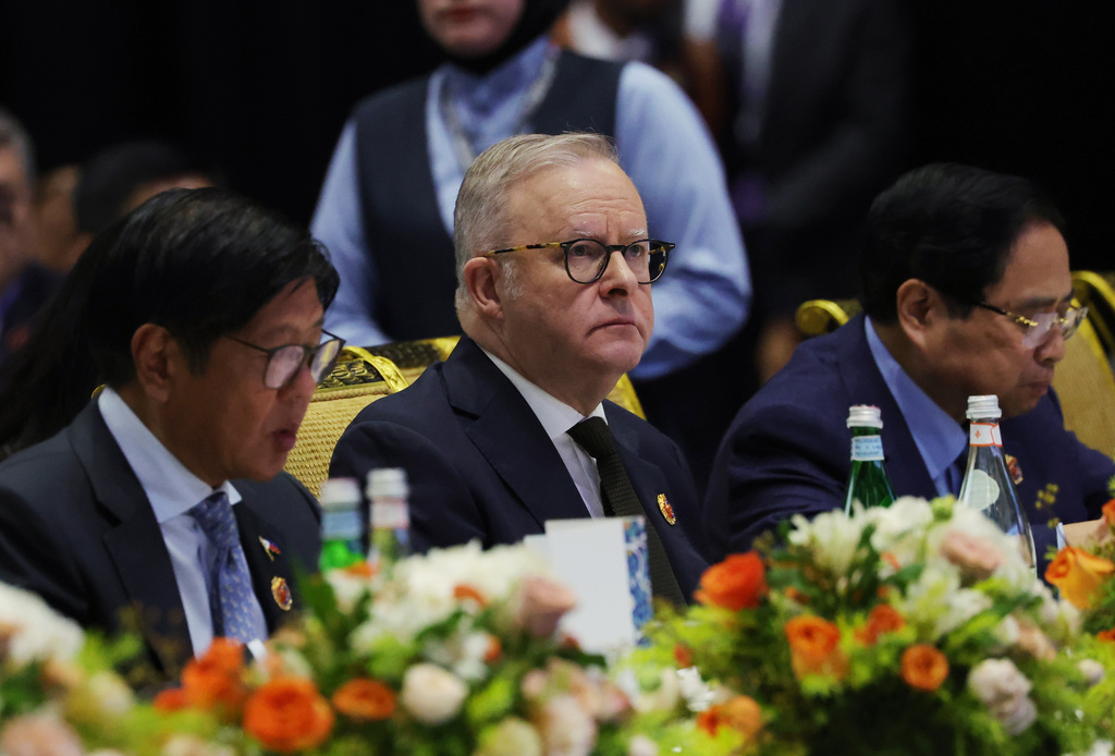 Philippine President Ferdinand Marcos Jr., from left, Australia's Prime Minister Anthony Albanese, and Vietnam's Prime Minister Pham Minh Chính watch a performance at the reception for East Timor's admission to ASEAN on the sidelines of the Association of Southeast Asian Nations (ASEAN) summit at the Kuala Lumpur Convention Centre in Kuala Lumpur, Malaysia, Monday, Oct. 27, 2025. (How Hwee Young/Pool Photo via AP)
