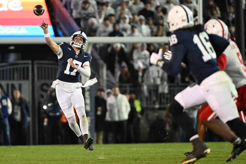 Penn State quarterback Ethan Grunkemeyer (17) throws a pass against Nebraska during the second quarter of an NCAA college football game, Saturday, Nov. 22, 2025, in State College, Pa. (AP Photo/Barry Reeger)