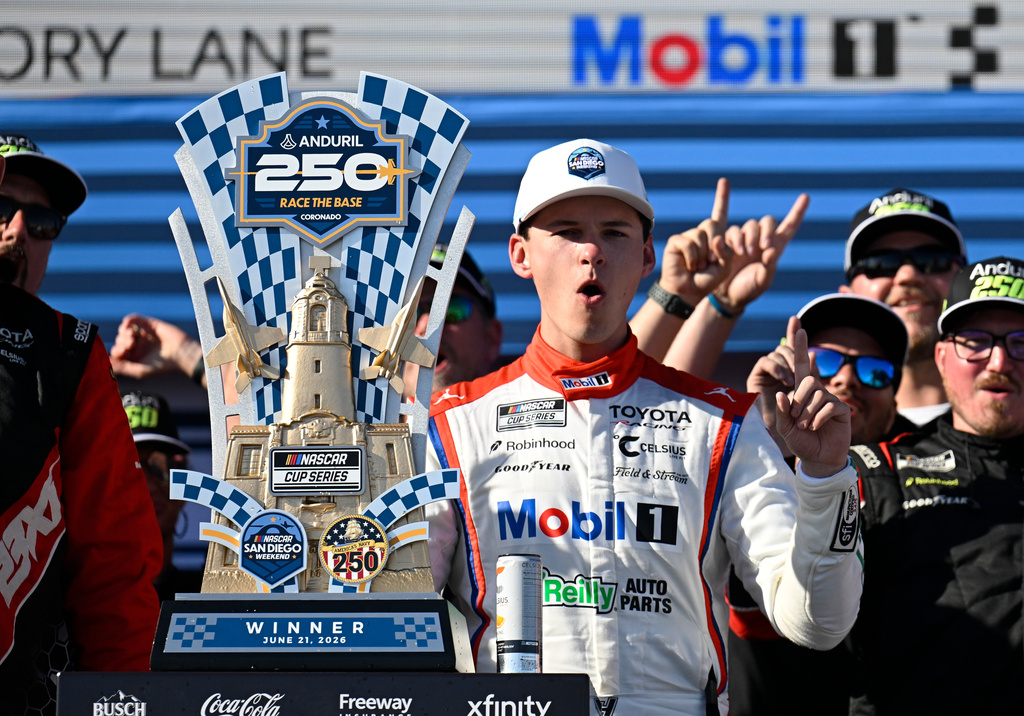 Cory Heim celebrates in Victory Lane after winning a NASCAR Cup Series auto race, Sunday, June 21, 2026, in Coronado, Calif. (AP Photo/Denis Poroy)