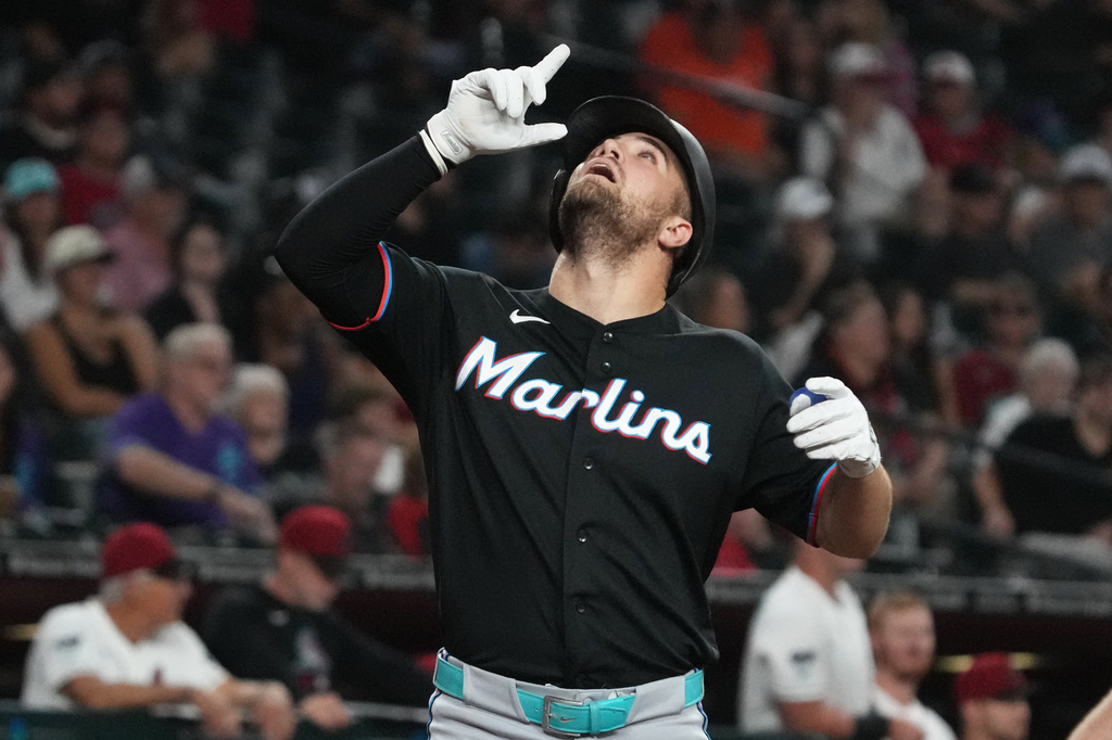 Miami Marlins' Jakob Marsee looks skyward after hitting a solo home run against the Arizona Diamondbacks in the fourth inning of a baseball game, Monday, Sept 14, 2026, in Phoenix. (AP Photo/Rick Scuteri)