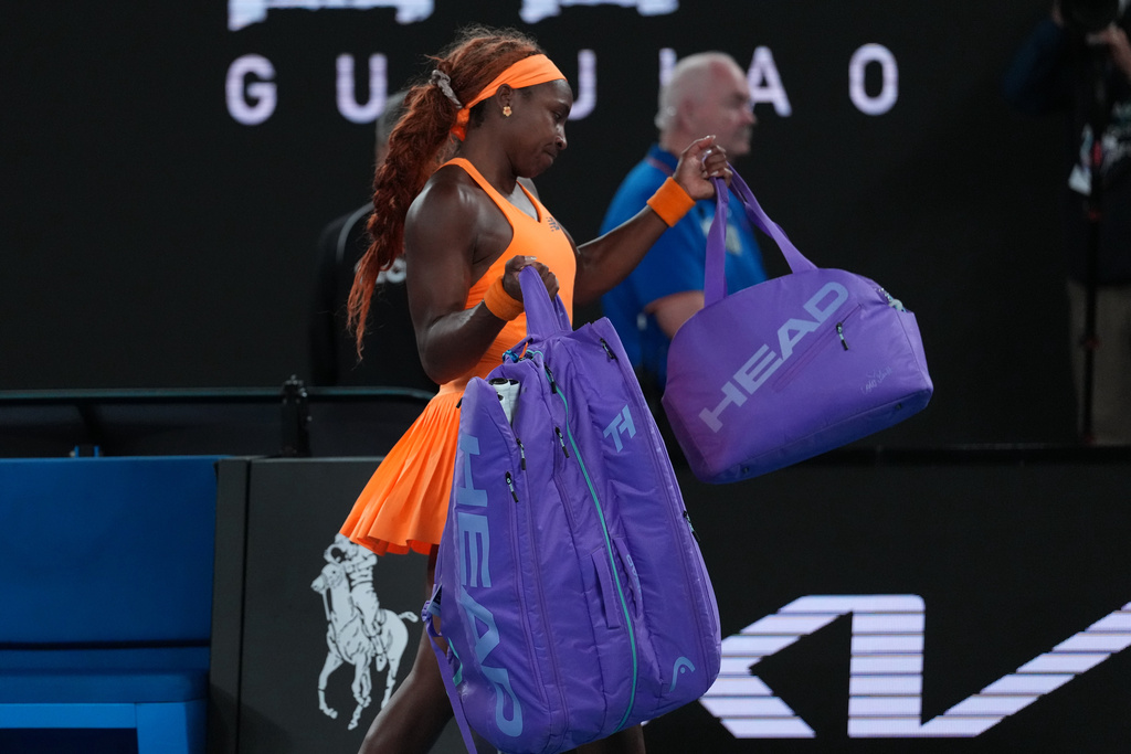 Coco Gauff of the U.S. walks from the court following her quarterfinal loss to Elina Svitolina of Ukraine at the Australian Open tennis championship in Melbourne, Australia, Tuesday, Jan. 27, 2026. (AP Photo/Dita Alangkara)