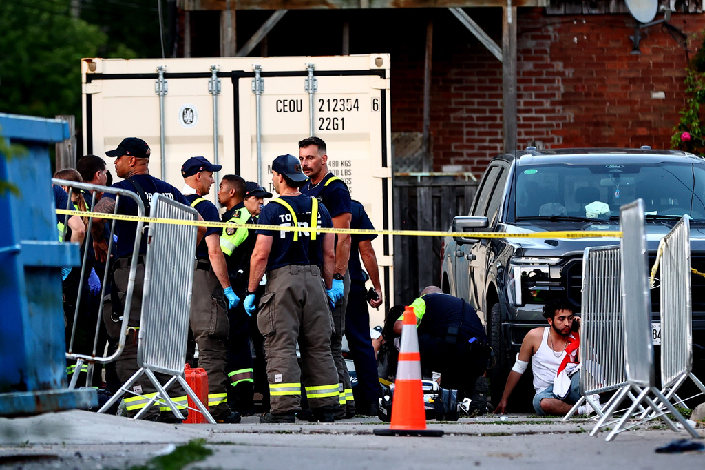 Paramedics respond to an active shooter at the Salsa on St. Clair event in Toronto, Saturday, July 11, 2026. (Keito Newman/The Canadian Press via AP)
