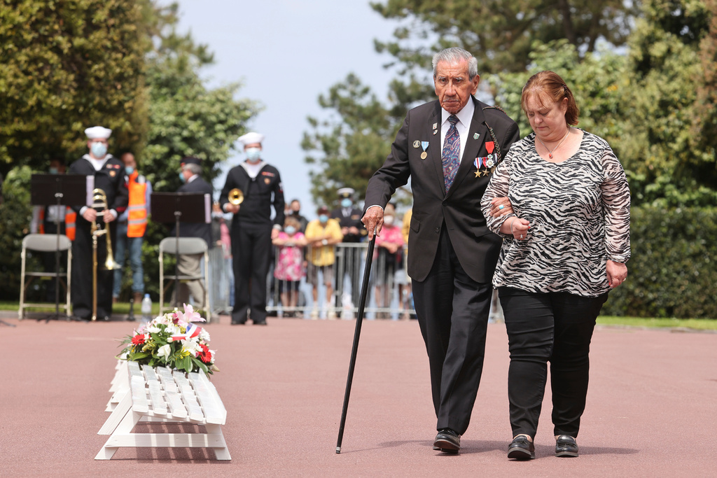 FILE - WWII veteran Charles Shay, 96, pays tribute during a ceremony in the Normandy American Cemetery of Colleville-sur-Mer, Normandy, Sunday, June, 6 2021. (AP Photo/David Vincent, File)