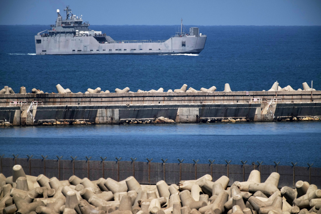 An Israeli Navy vessel moves in the Mediterranean sea toward the port of Ashdod, Israel, Thursday, Oct. 2, 2025. (AP Photo/Leo Correa)