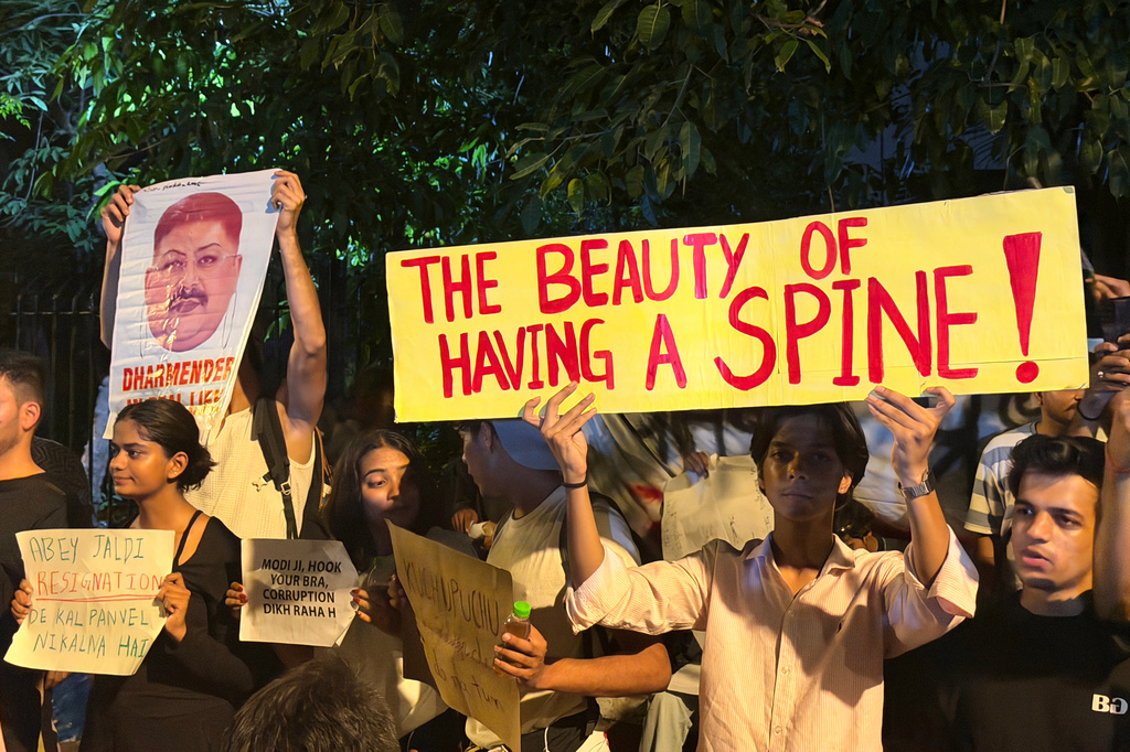 Protestors take part in a demonstration demanding educational reforms as part of the Cockroach Janta Party's ongoing protest movement in New Delhi, India, Thursday, July 23, 2026. (AP Photo/Verda Subzwari)
