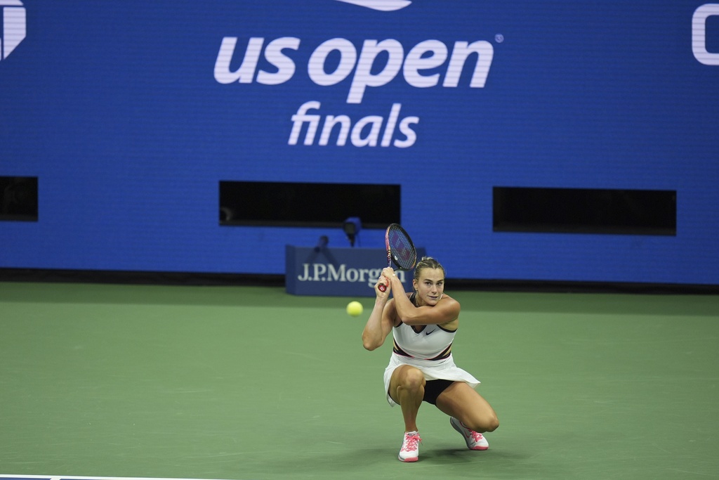 Aryna Sabalenka, of Belarus, returns a shot against Amanda Anisimova, of the United States, during the women's finals of the U.S. Open tennis championships, Saturday, Sept. 6, 2025, in New York. (AP Photo/Seth Wenig)