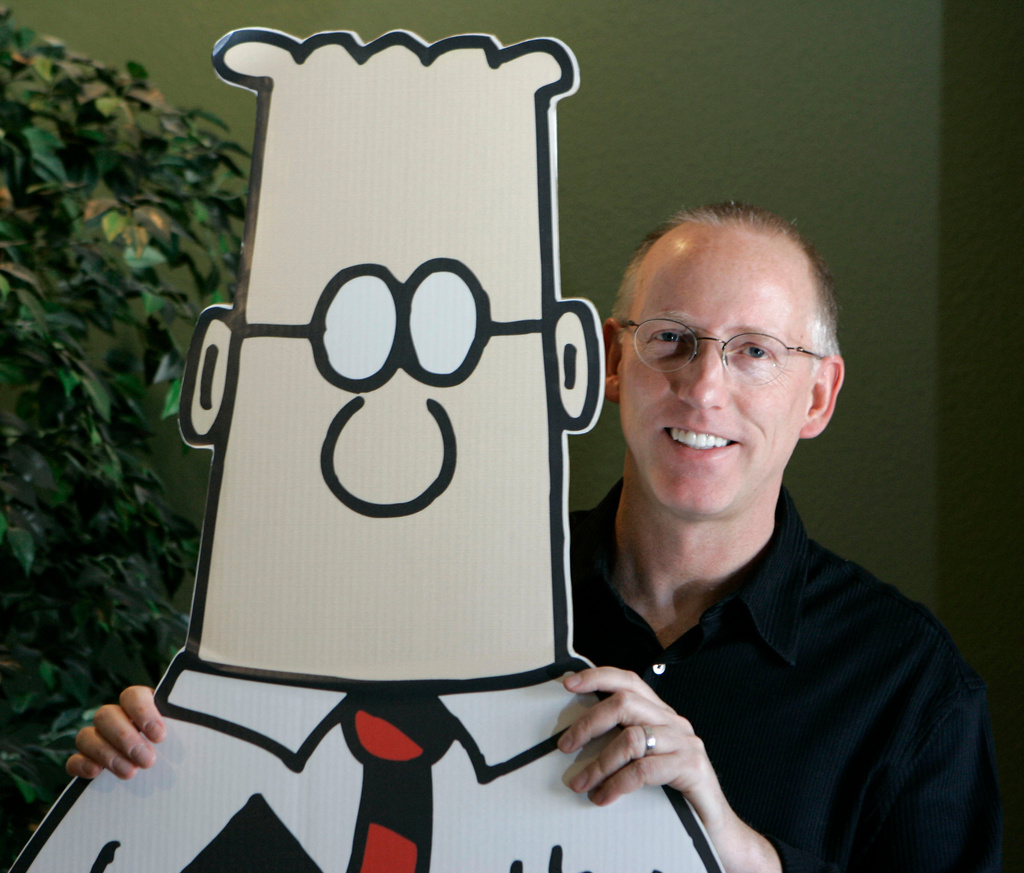 FLE - Scott Adams, creator of the comic strip Dilbert, poses for a portrait with the Dilbert character in his studio in Dublin, Calif., Oct. 26, 2006. (AP Photo/Marcio Jose Sanchez, File)