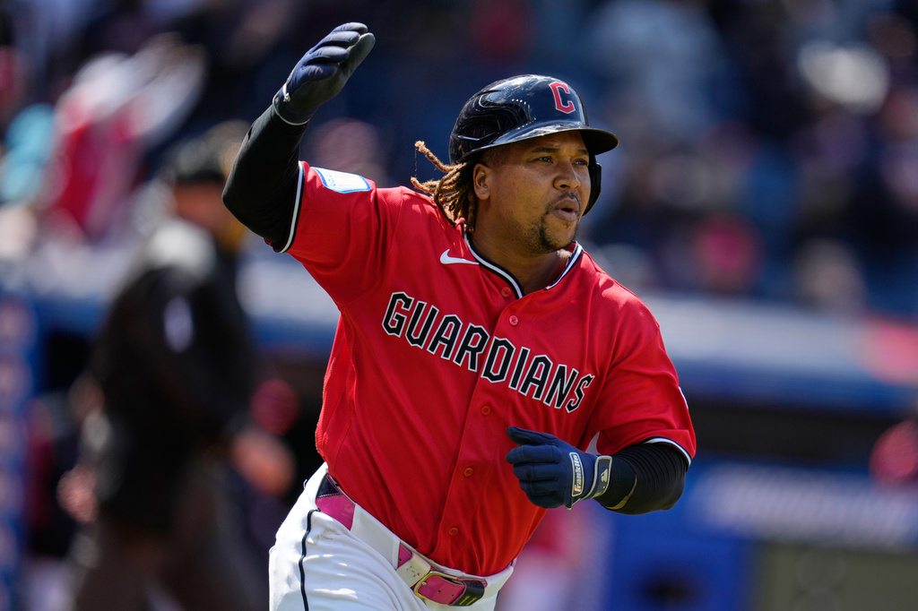 Cleveland Guardians' José Ramírez celebrates as he runs the bases with a solo home run in the fifth inning of a baseball game against the Baltimore Orioles in Cleveland, Sunday, April 19, 2026. (AP Photo/Sue Ogrocki)