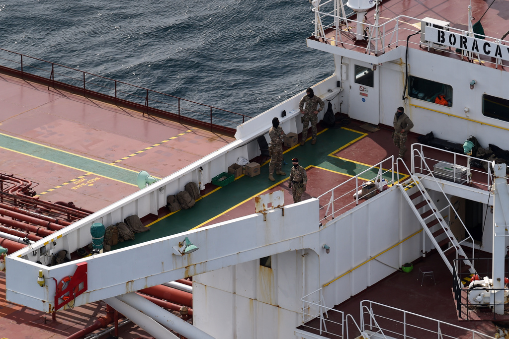 Soldiers stand on the deck on the tanker Boracay that allegedly belongs to Russia's so-called shadow fleet, Thursday, Oct. 2, 2025, off Saint-Nazaire, France's Atlantic coast. (AP Photo/Mathieu Pattier)