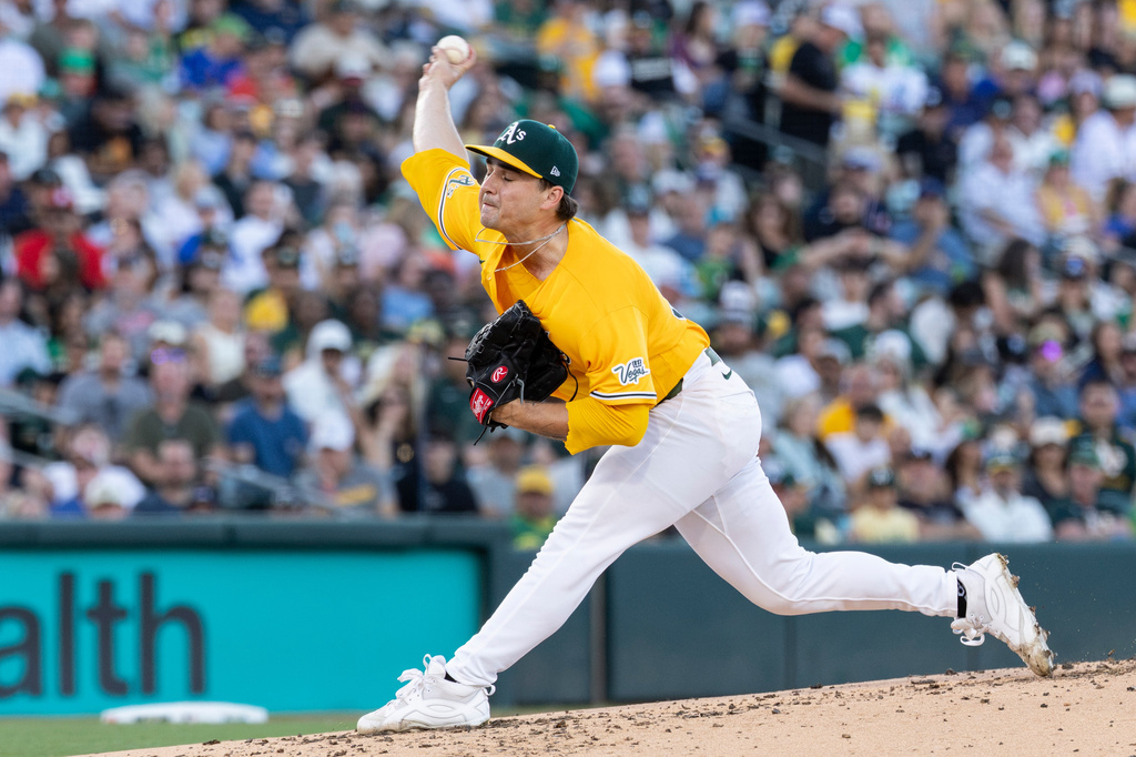 Athletics pitcher J.T. Ginn throws to the Washington Nationals during the second inning of a baseball game Saturday, July 18, 2026, in West Sacramento, Calif. (AP Photo/Sara Nevis)