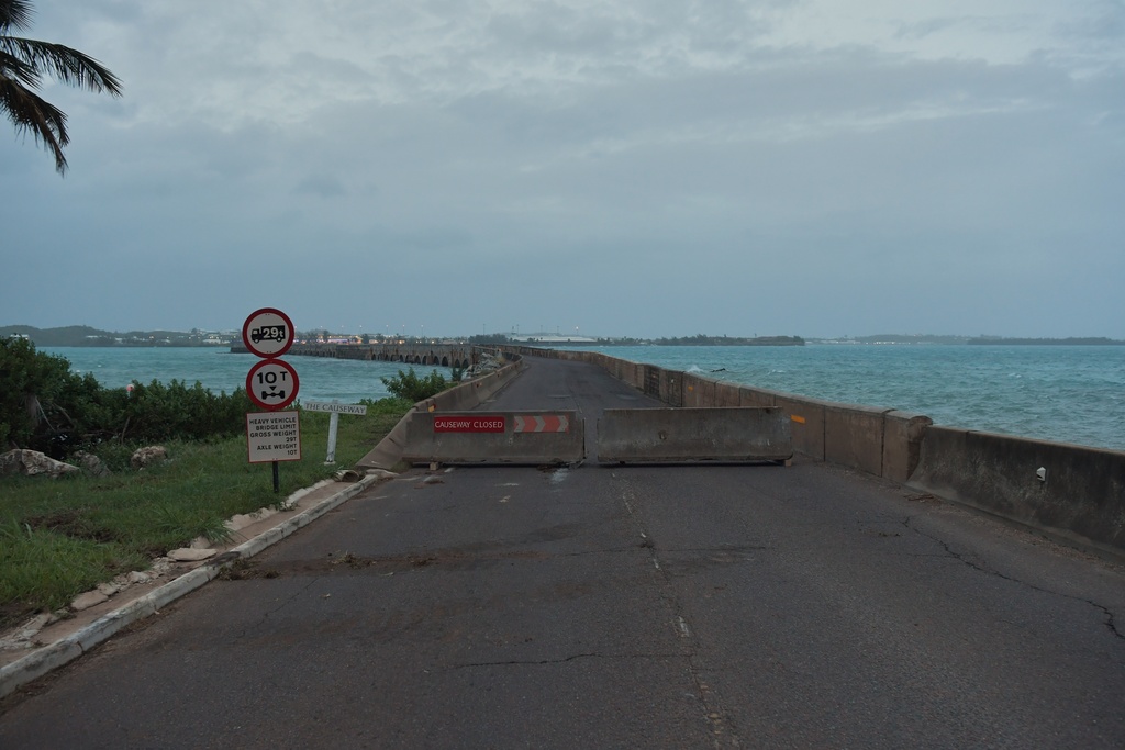 Cinderblocks restrict access to a cross-bay causeway ahead of Hurricane Imelda's expected arrival in Hamilton, Bermuda, Wednesday, Oct. 1, 2025. (AP Photo/Anthony Wade)