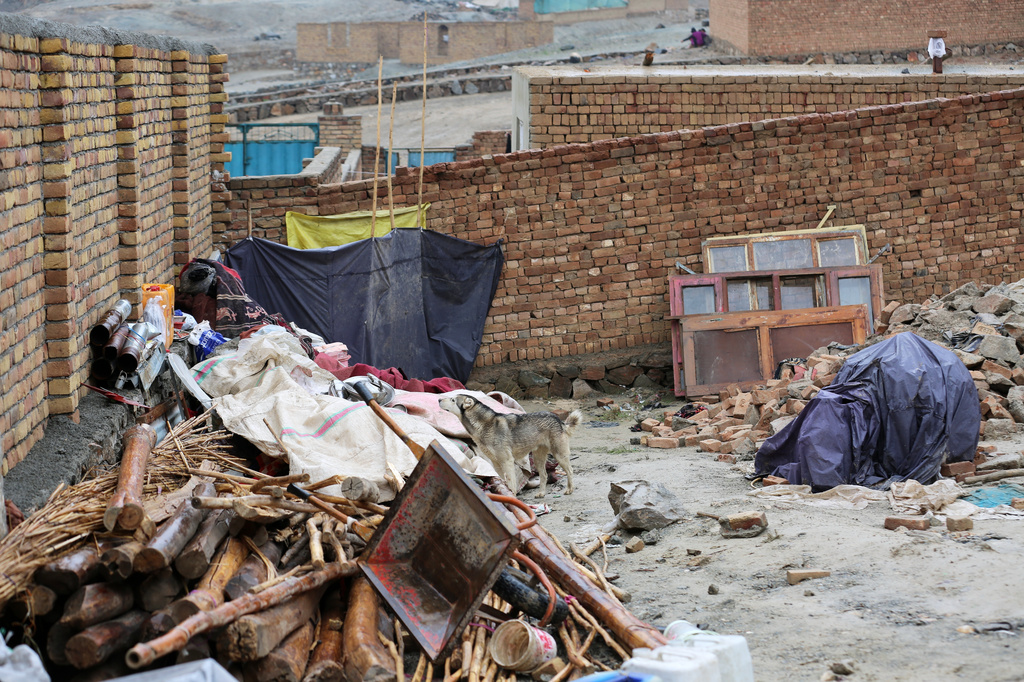 Items are seen piled up at a house damaged by an earthquake in the village of Ittefaq, on the outskirts of Kabul, Afghanistan, Saturday, April 4, 2026. (AP Photo/Siddiqullah Alizai)
