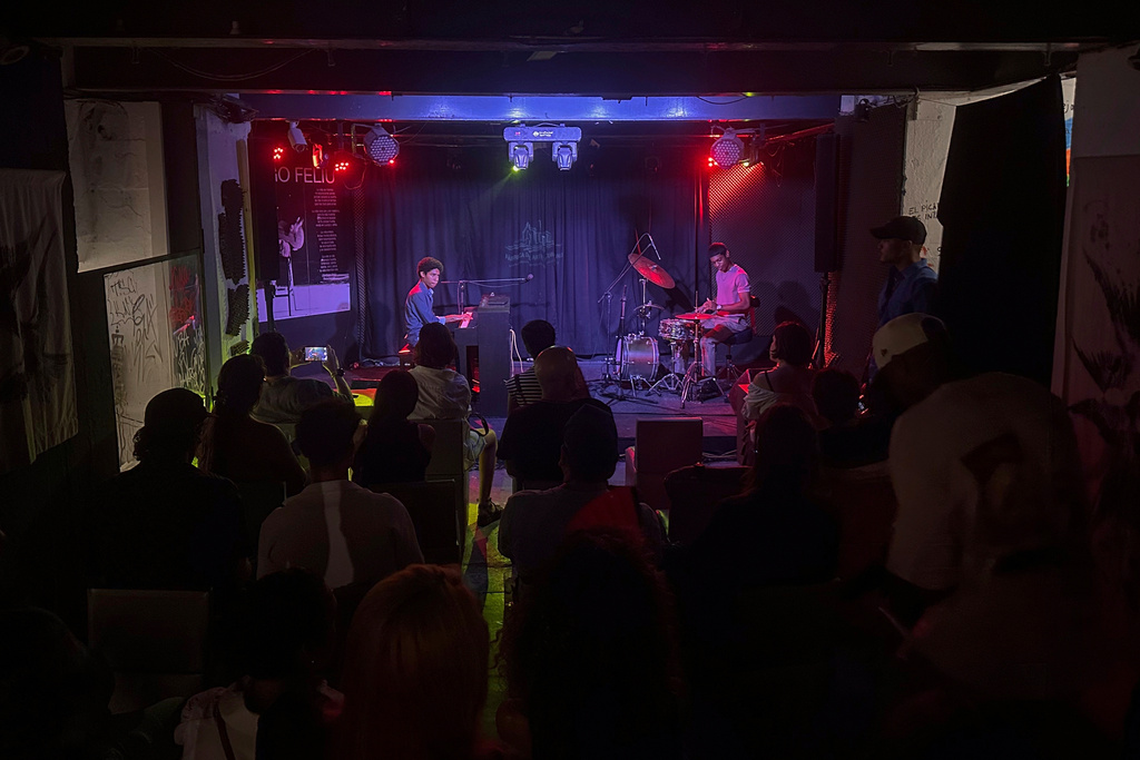 The Abreu brothers Diego, left, and Fabio, part of a new generation of musicians revitalizing Cuba’s music scene, perform at a private bar in Havana, Thursday, Aug. 28, 2025. (AP Photo/Ramon Espinosa)