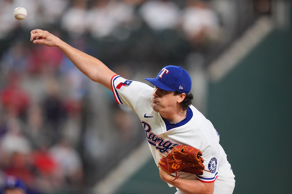 Texas Rangers starting pitcher Cal Quantrill throws during the first inning of a baseball game against the Washington Nationals, Tuesday, Aug. 18, 2026, in Arlington, Texas. (AP Photo/LM Otero)