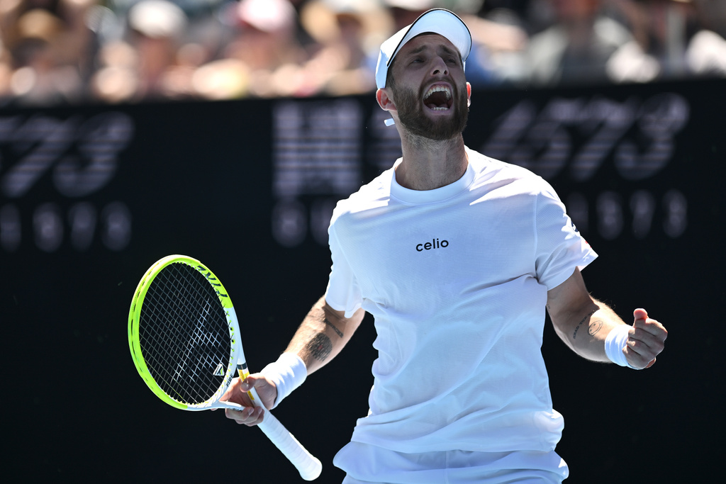 Corentin Moutet of France reacts during his first round match against Tristan Schoolkate of Australia at the Australian Open tennis championship in Melbourne, Australia, Sunday, Jan. 18, 2026. (Lukas Coch/AAP Image via AP)