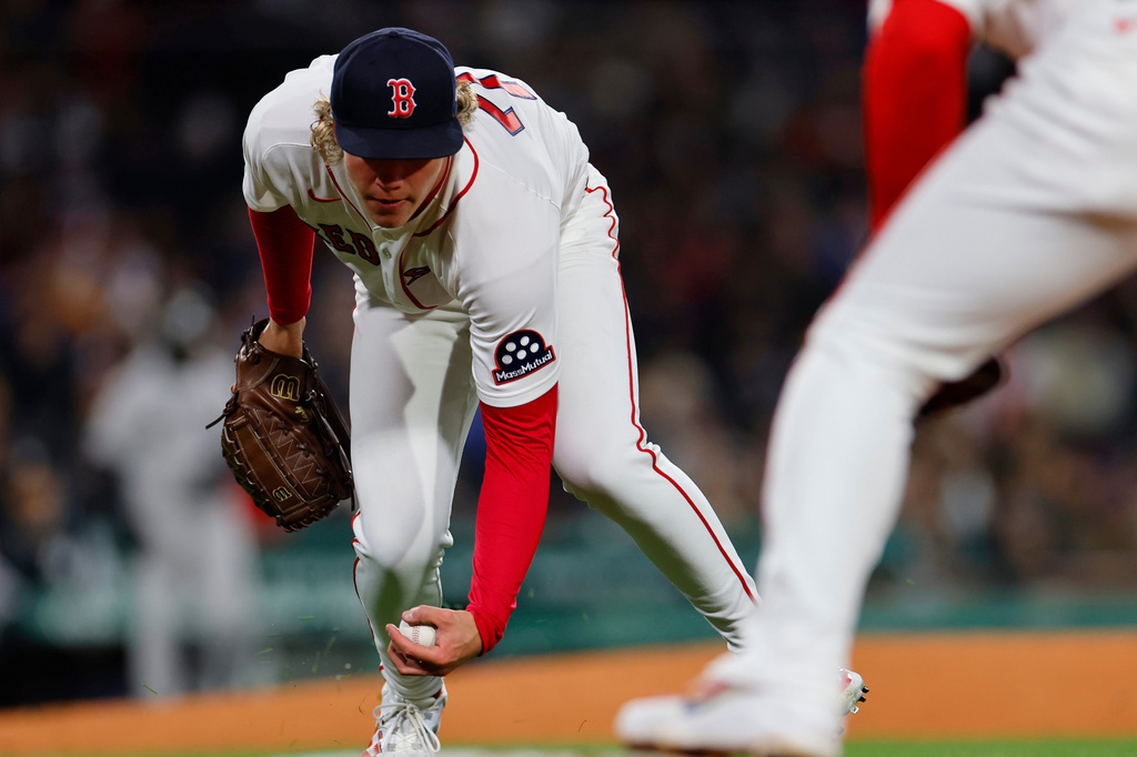 Boston Red Sox pitcher Connelly Early barehands the ball during the fifth inning of a baseball game against the New York Yankees on Tuesday, April 21, 2026, in Boston. (AP Photo/CJ Gunther)