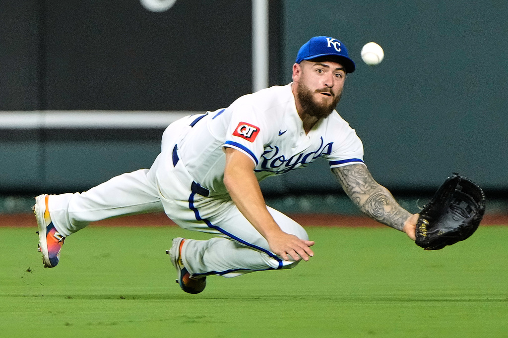 Kansas City Royals center fielder Kyle Isbel catches a sacrifice fly hit by Miami Marlins' Jared Serna to score one run during the sixth inning of a baseball game Wednesday, Sept. 2, 2026, in Kansas City, Mo. (AP Photo/Charlie Riedel)