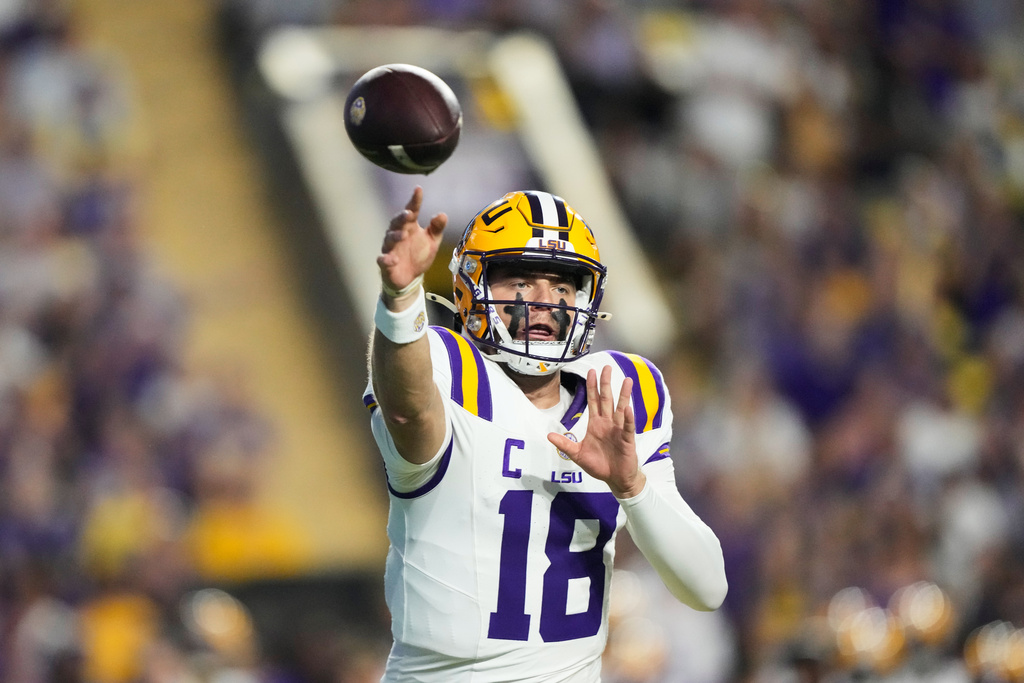 LSU quarterback Garrett Nussmeier (18) passes in the first half of an NCAA college football game against South Carolina, Saturday, Oct. 11, 2025 in Baton Rouge, La. (AP Photo/Gerald Herbert)