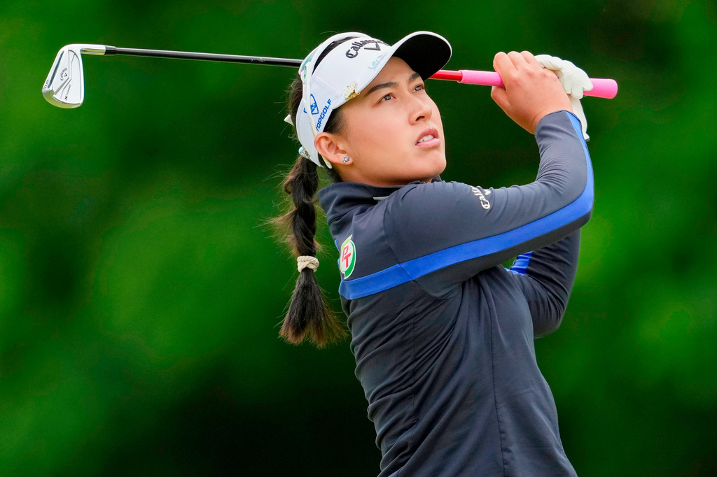 Jeeno Thitikul plays a shot from the fairway on the sixth hole during the first round of the Queen City Championship LPGA golf tournament at Maketewah Country Club, Thursday, May 14, 2026, in Cincinnati. (AP Photo/Jeff Dean)