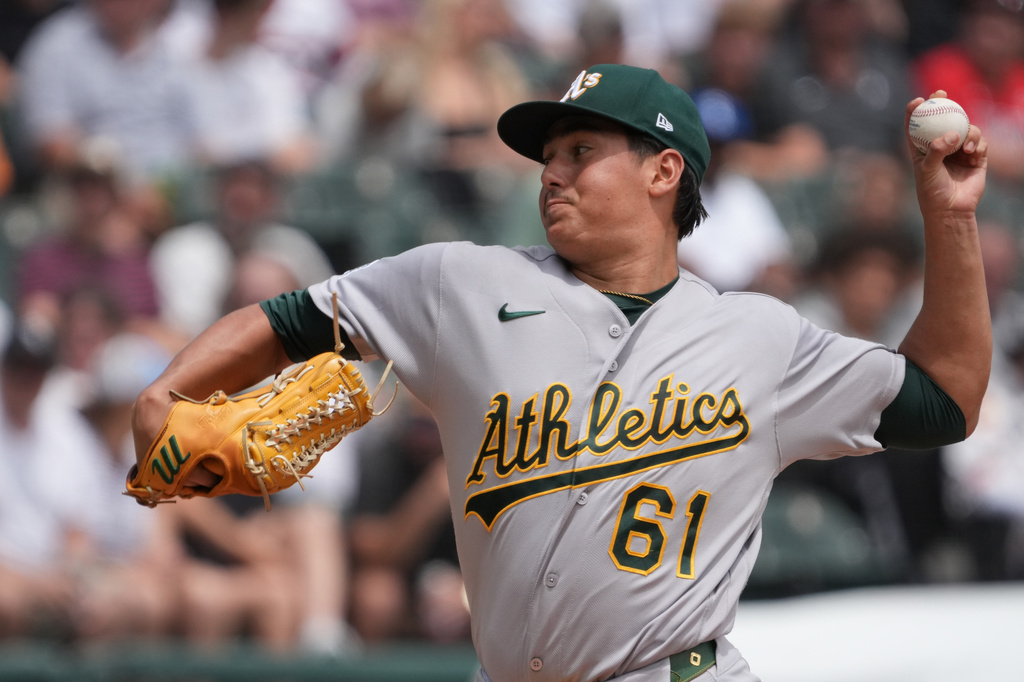 Athletics pitcher Gage Jump shows the ball against the Chicago White Sox during the first inning of a baseball game Saturday, July 11, 2026, in Chicago. (AP Photo/David Banks)